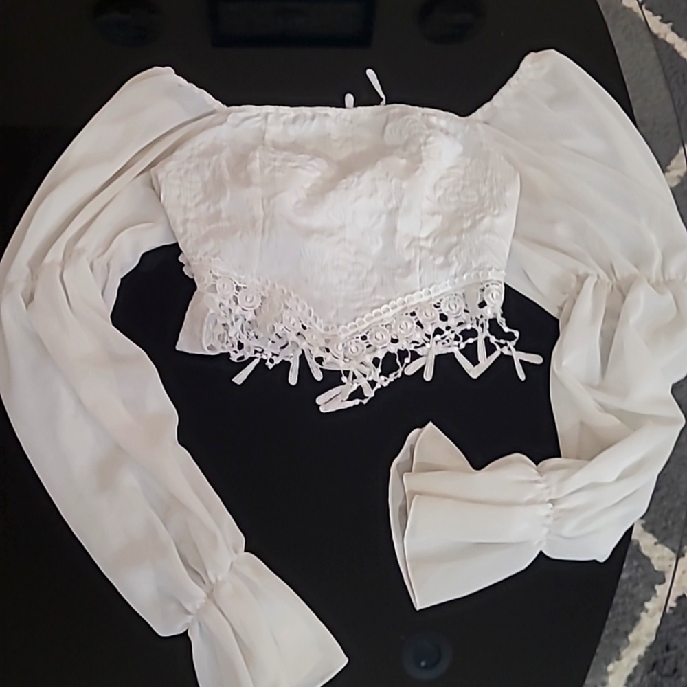 Long sleeve cream sweater.